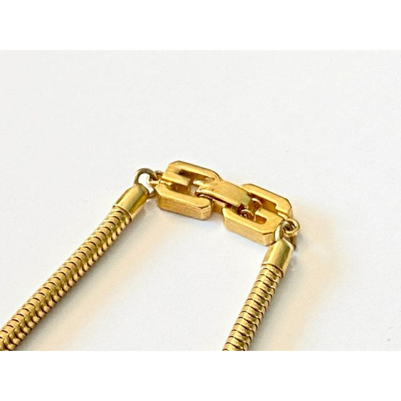 Givenchy 1978 Goldtone Thermoset Necklace & Clip Earrings
